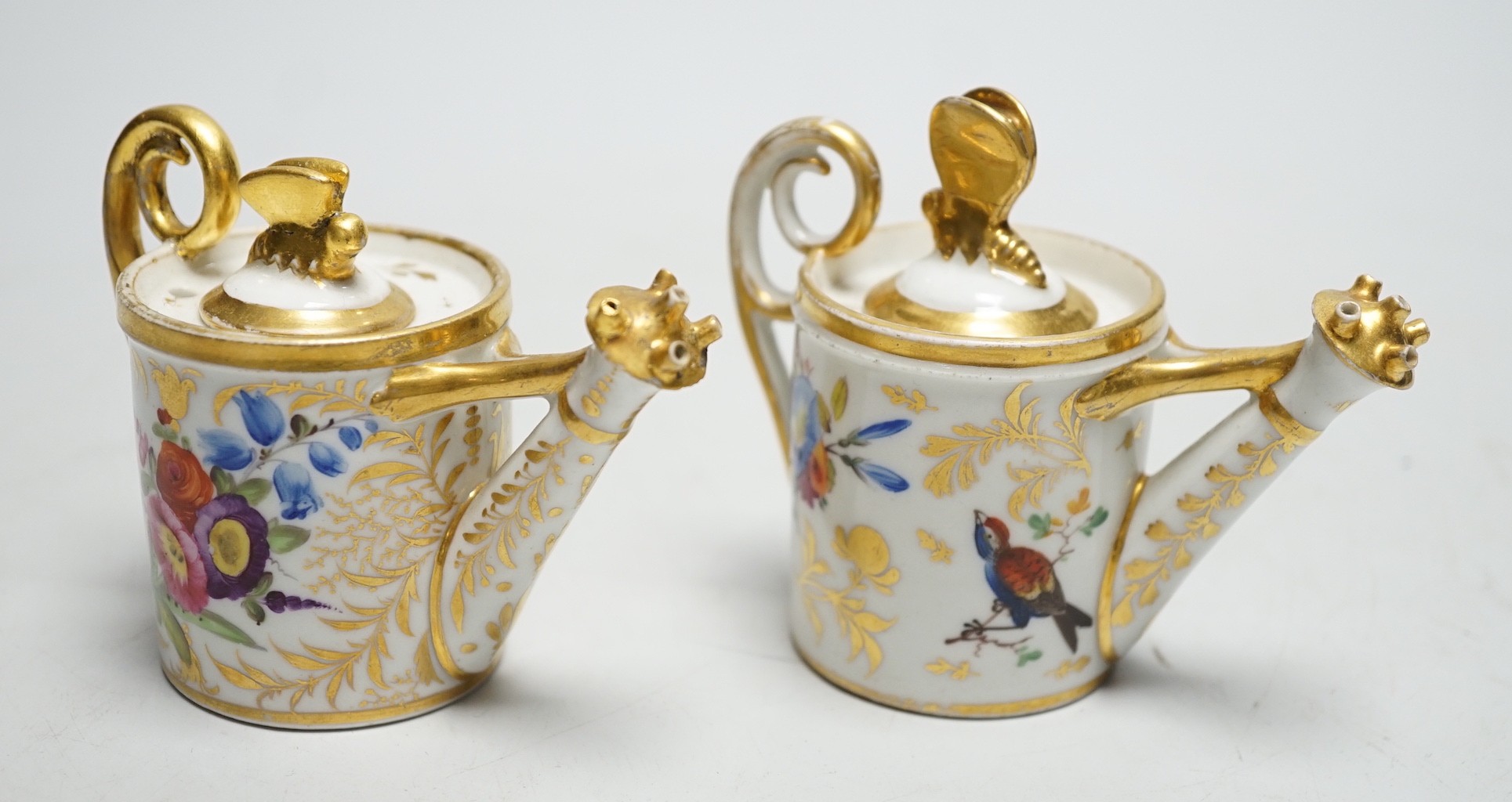 Toy porcelain: Two English porcelain rosewater sprinklers, c.1810, possibly Coalport, each modelled in the form of a watering can